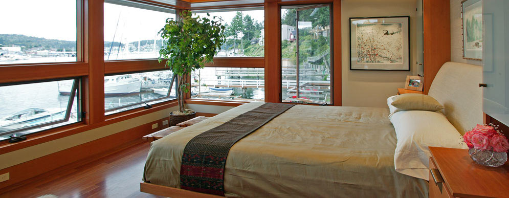 Bedroom at Marina with woodframe windows