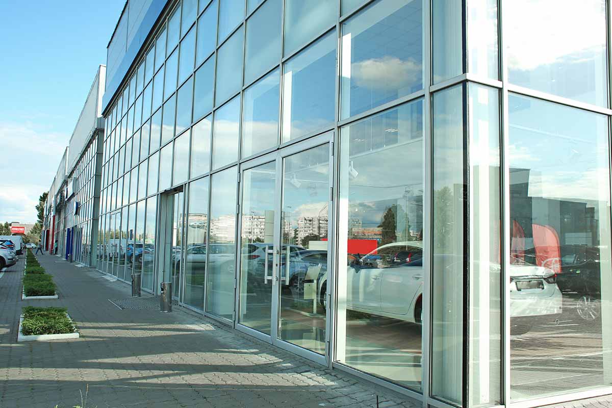 Glass panels on car dealership building